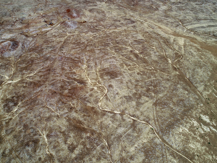 Architectural features of the ancient Mesopotamian city of Lagash in present-day southern Iraq are visible in this aerial photograph. (Courtesy Emily Hammer)