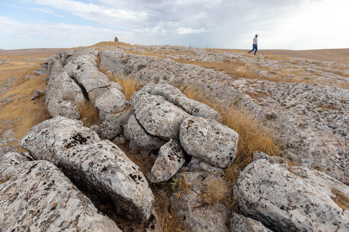 One of the quarries at Karahantepe where residents gathered stone to create the site’s monumental structures.